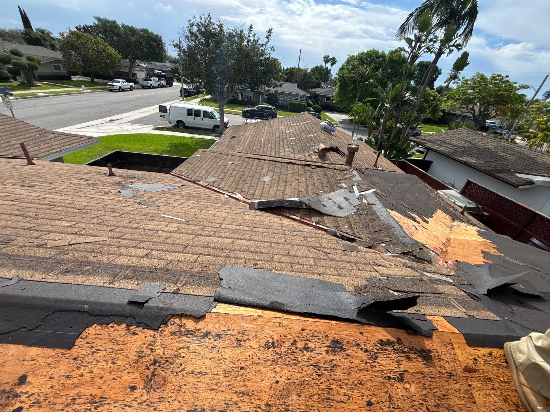 Storm damage exposing roof underlayment and decking